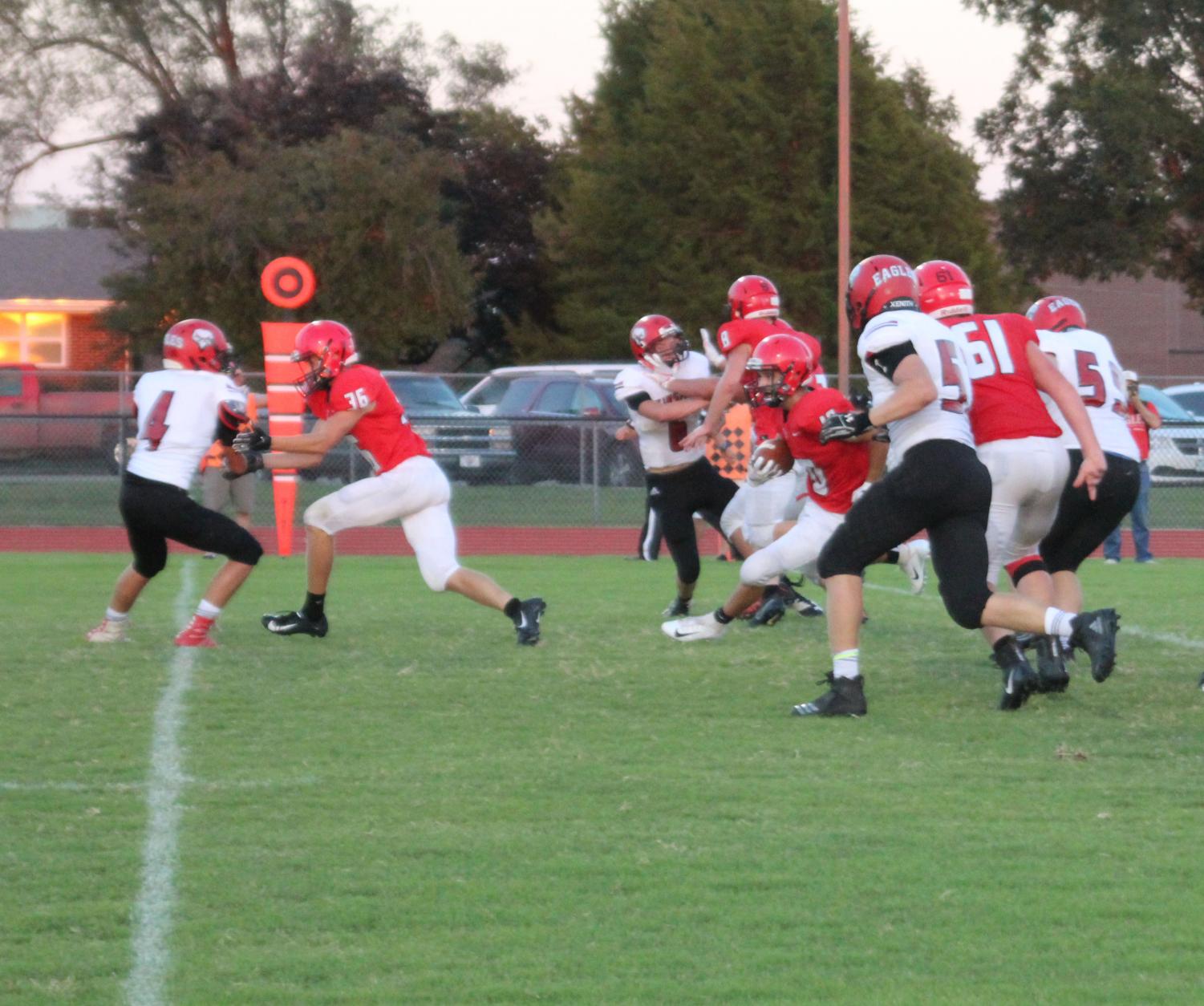 Senior Zach Mercer runs the ball and gets through the Eagles defense