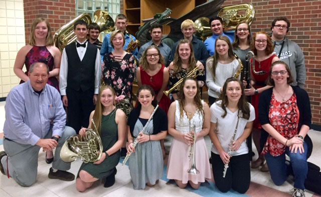 After a long day of practice, honor band and choir participants pose for a photo. The students spent time practicing from 9 a.m. until the performance at 4 p.m. Courtesy photo by Kristy Martin