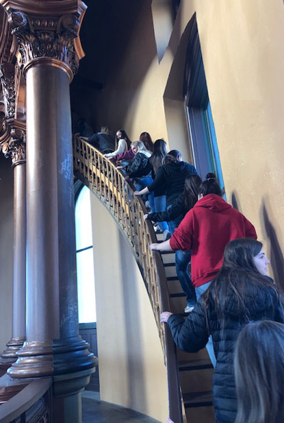 	At the Capitol building, the seniors climb the steps to the top of the dome. They were able to go on the dome tour as an addition to their overall tour of the Capitol. Photo courtesy of Jennifer Kunz. 