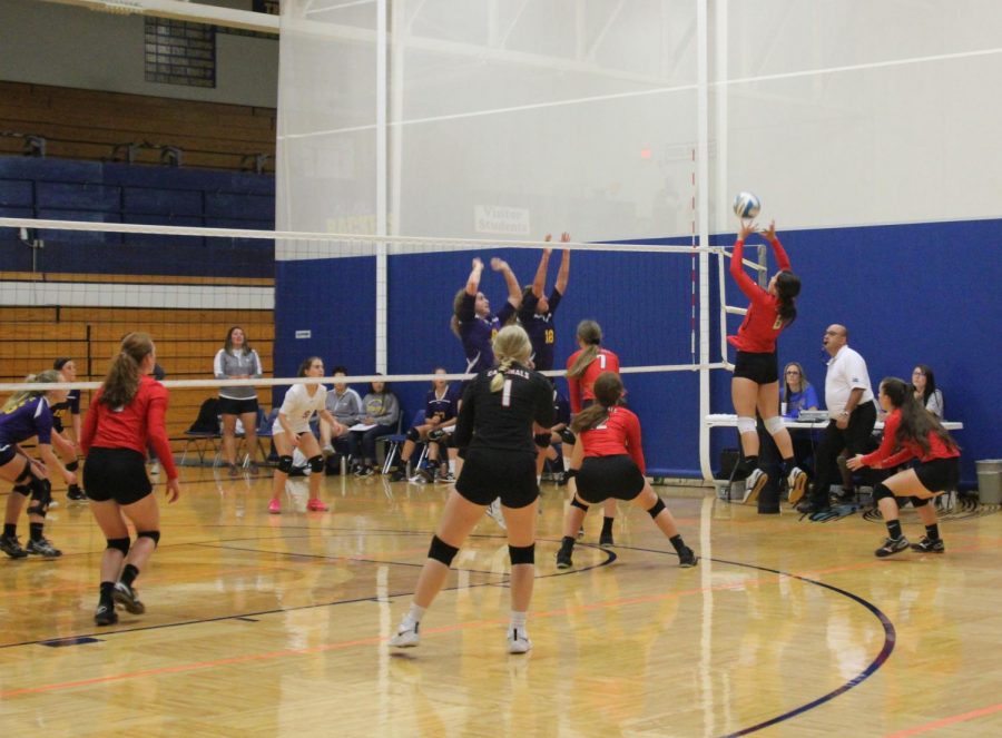 At the tournament held in Chaparral on Sept. 21, senior Karley Mooneyham tips the ball over the net. 
