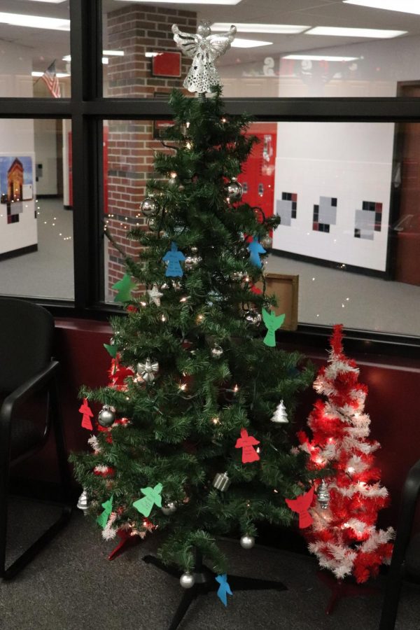 Located in the office, the Angel Tree is decorated with paper angels with lists of gifts for residents at the care home. Honor Society hosted the project, and any student or faculty member was able to participate. 