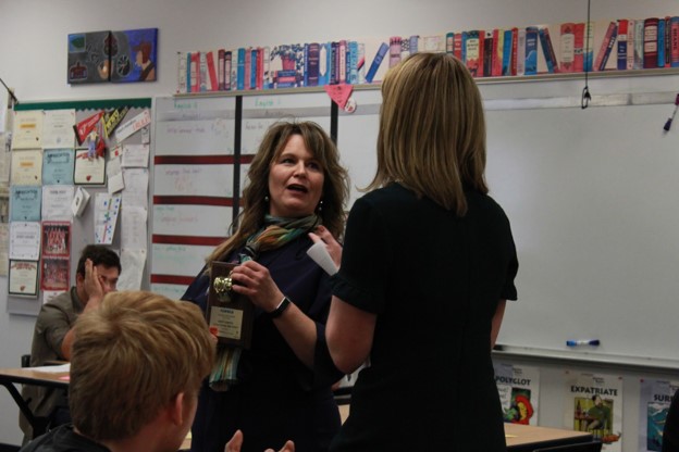 Surprised and shocked, English teacher Kristy Martin received the Golden Apple Award from KAKE news. She was nominated by four students from various grades and was presented with the award on Nov. 20. The news segment aired Nov. 25.