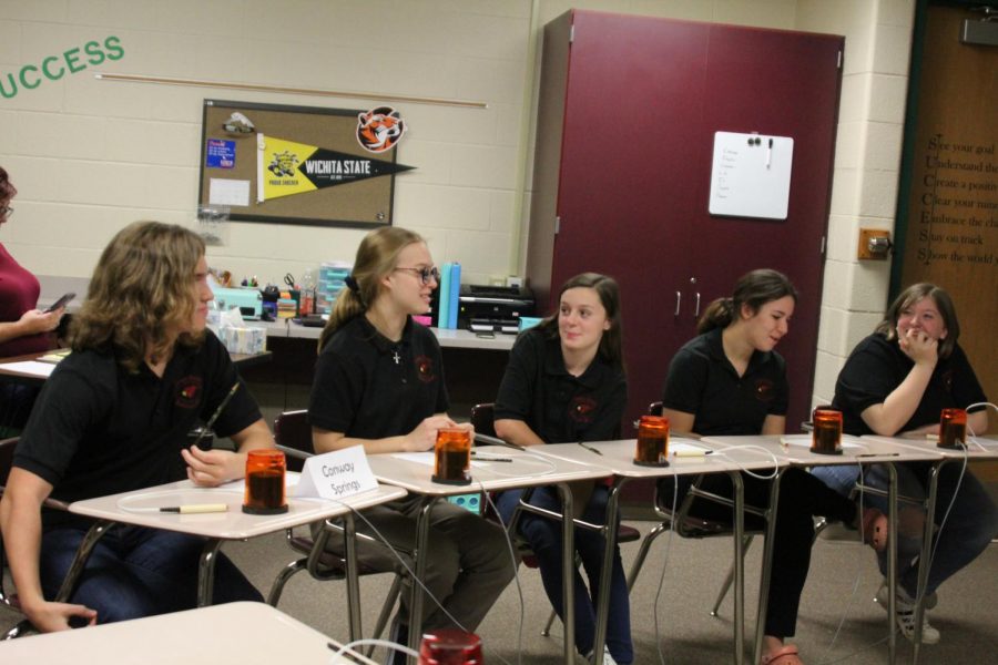 Junior Owen Balman, junior Natalie Drouhard, freshman Cheyanne Tull, sophomore Averie Stull and junior Rylie Thompson debate and come up with the answers for the JV Mulvane Scholars Bowl meet. 