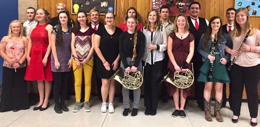 After the Honor Band/Choir concert, performers gather to take a group picture. Many students felt the concert was a success. “I feel the concert went really well,” junior and soprano Sydney Boese said. “We did a lot of practicing and got a lot done.”
