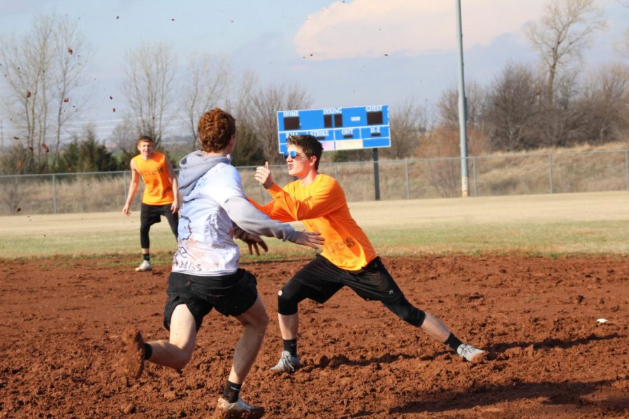 During last years Kickball Tournament, freshman Derek Osner prepares to catch the ball to get out junior Cody Jones.