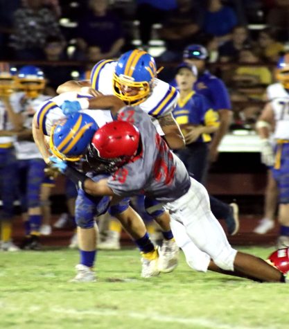 During the game against Chaparral on Sept. 16, senior Jose Robles makes a tackle on the other team. The ending score was 15-40.   