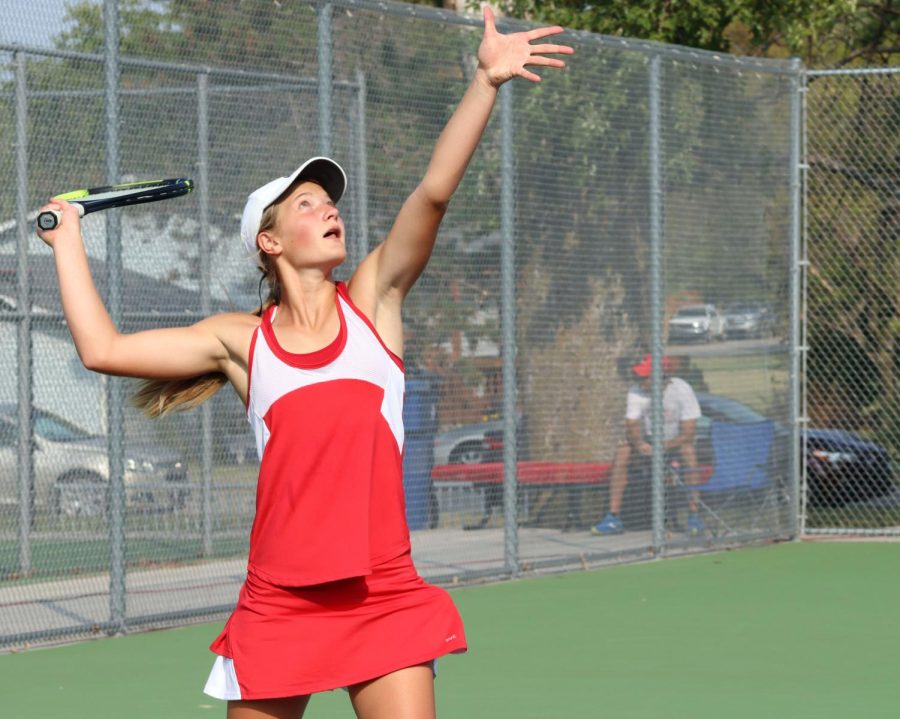 At+home+Sept.+13%2C+freshman+Morgan+Koester+is+up+to+serve.+She+was+competing+in+singles+at+the+meet.