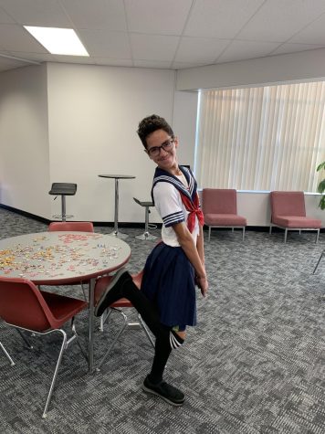 For the student Halloween costume contest, freshman Isaiah Rivera dresses as a school girl. His costume ended up winning the contest.
