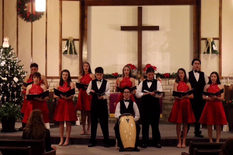 The+Cardinalaires+sing+the+song+%E2%80%9CTiny+Little+Baby%E2%80%9D+at+the+BPW+concert+Dec.+1.+This+song+was+sung+a+cappella+with+a+drum+played+by+Isaiah+Rivera.