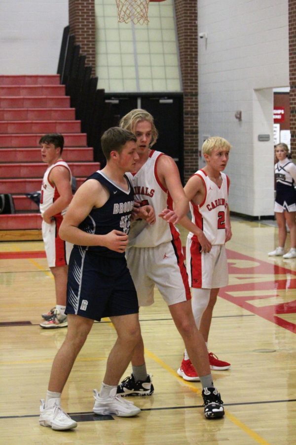 On Dec. 16, Conway Springs hosted Remmington in a hard-fought basketball game. Junior Nash Johnsen tries to block a Remmington player from receiving the ball. 
