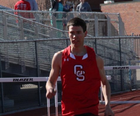 Senior Jack Hartman runs in the 4x8 relay at Clearwater March 31. The relay placed 3rd overall. 
