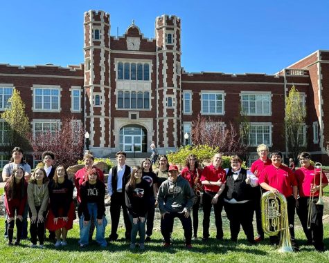 Competitors pose in front of Kansas Wesleyan on April 29. All performances received a I or II rating. 