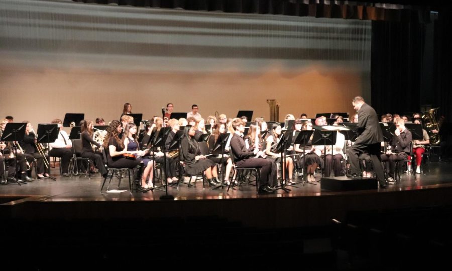 To start the concert season, some members of the Cardinal Pride Band perform in the Central Plains League honor band. Honor band was held in Douglass Jan. 14.
