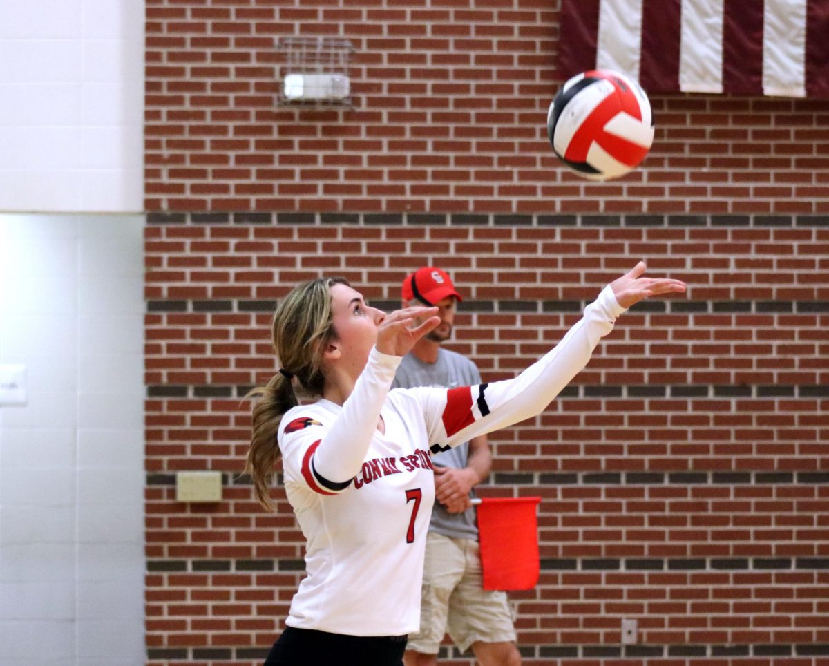 At the first volleyball home game Aug. 31, senior Olivia Lange serves the ball. They ended with a record of 1-2 for the night. 