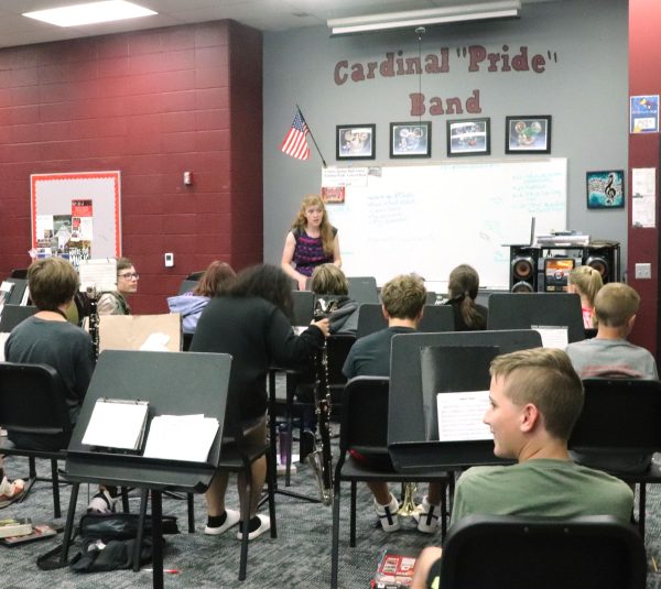Band director Stephanie Bodley teaches the students the music for the parade. One of the songs the students are playing at Fall Fest is “My Generation” by the Who.
