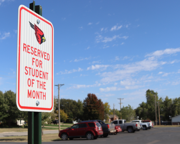 One of the perks of being student of the month is a designated parking spot. The other one is a voucher for a free calzone and drink at Gambino’s Pizza.