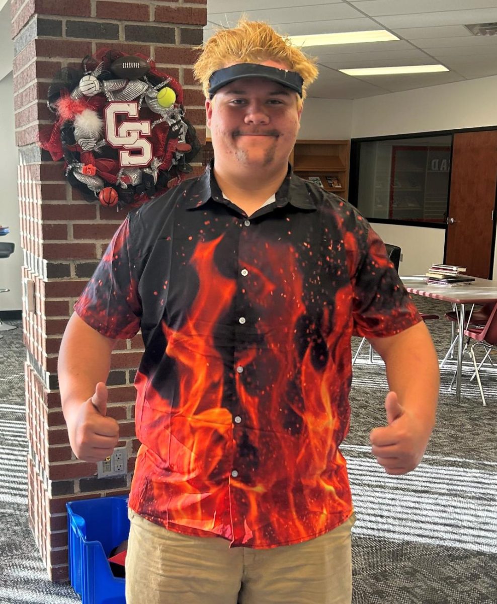 Sophomore Ashton Stull won first place in the costume contest as Guy Fieri. There was plenty of competition, so first place is definitely a big deal. Photo contributed by Callie Bartelson.