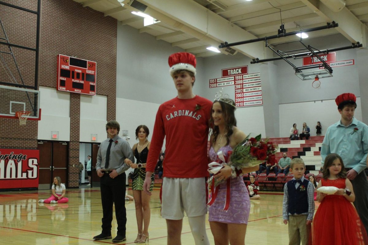 Winter+Homecoming+King+and+Queen+Nash+Johnsen+and+Melissa+Ebenkamp+pose+for+a+picture.+The+Homecoming+Ceremony+was+held+Feb.+16.+%0A