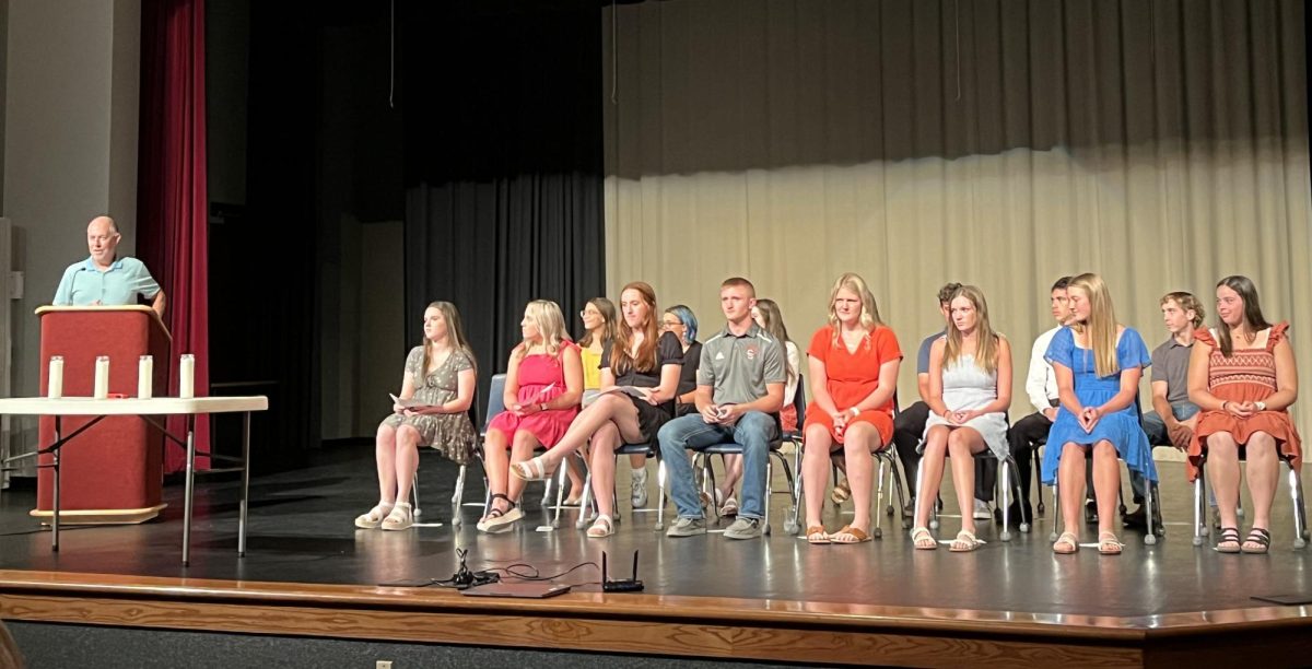 At the NHS induction ceremony, sponsor Chris Bellar talks about NHS and what it means. The ceremony took place on Sept. 18. Photo contributed by Lindsay Pauly