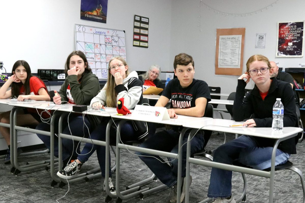 Freshmen Sophie Gerlach and Gauge Bishop along with sophomores Gus Hemberger, Kaelynn Downey, and Kendall Baggs, go against Andover in the championship round.